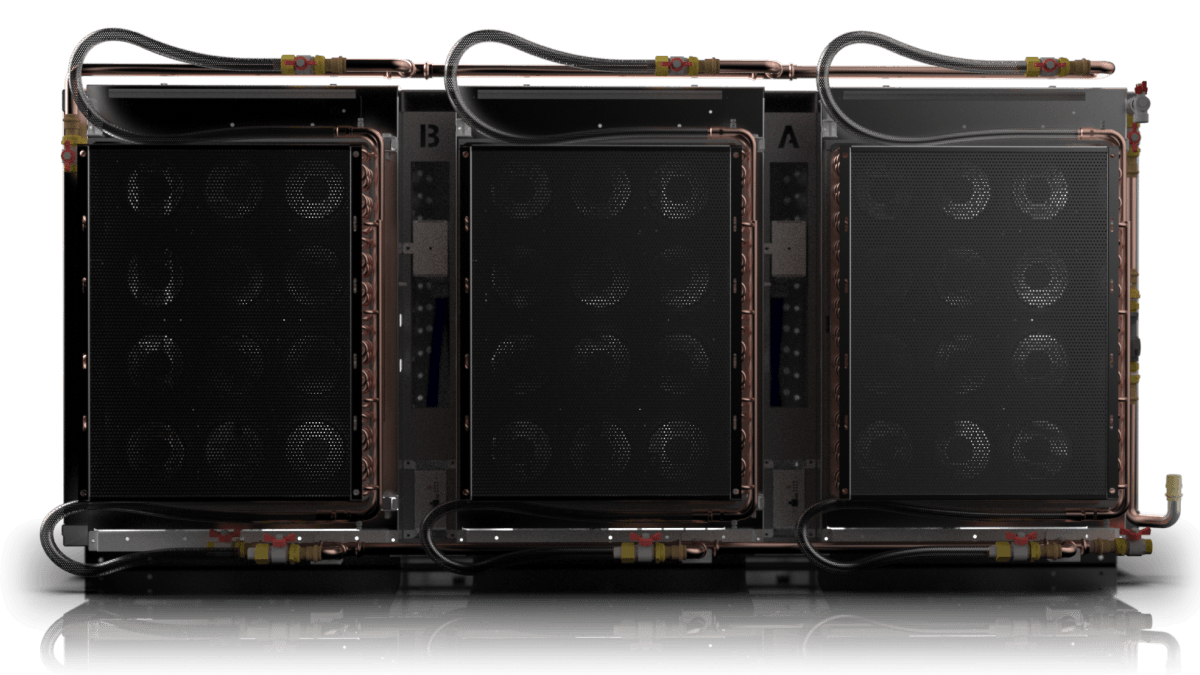 Three water-cooled server chassis modules with copper tubing manifold and fan arrays